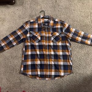 A blue brown holiday festive flannel shirt